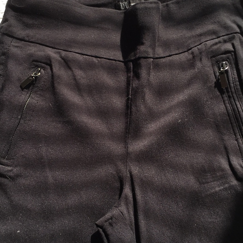 Black pull on polyester w/ side zipper pockets